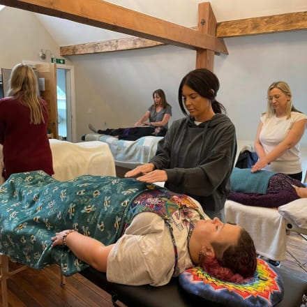Students practicing Reiki
